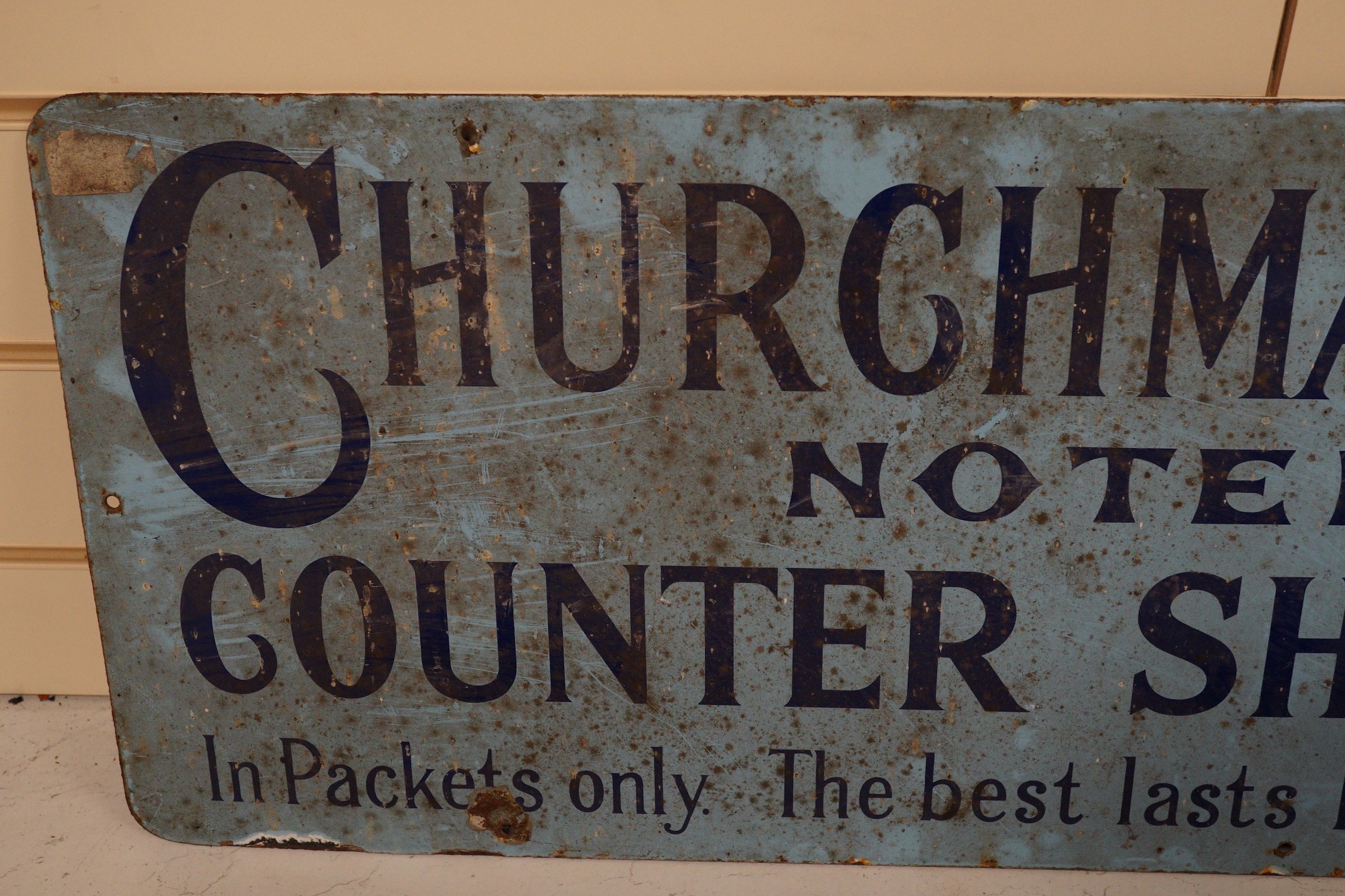 A Churchman's Noted Counter Shag enamel advertising sign, 30x60cm